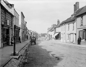 Cricklade High Street, Cricklade, Wiltshire, with some local inhabitants, c1860-c1922