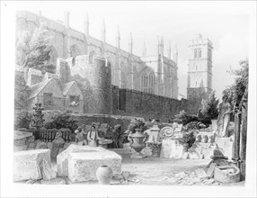 Stonemasons at work in front of the chapel at New College, Oxford, Oxfordshire