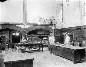 Cooks at work in the kitchens at New College, Oxford, Oxfordshire, 1901