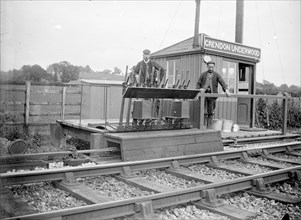 Signalmen pose outside a signal box near Grendon Underwood, Northamptonshire, c1872-c1923
