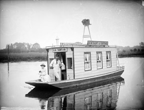 Henry Taunt on his floating studio near Oxford, Oxfordshire, 1895