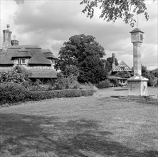 Sundial and cottages in Hallen Road, Blaise Hamlet, Henbury, Bristol, 1945