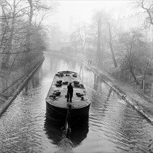 Canal and barge, London, (c1950-c1970?). Artist: Henry Grant