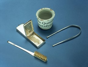 Toothbrush, box of dental powder and tongue-scraper, 18th century. Artist: Unknown