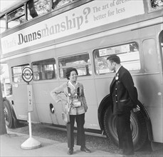 Bus conductress and driver at Crystal Palace, Sydenham, London, 1962. Artist: Henry Grant