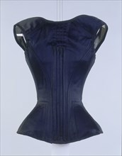 Black corset with a grey lining, c1881-c1885. Artist: Unknown