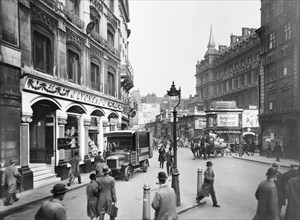 Cannon Street with Lyons shop, hotel and station, London, c1920-c1930.  Artist: George Davison Reid