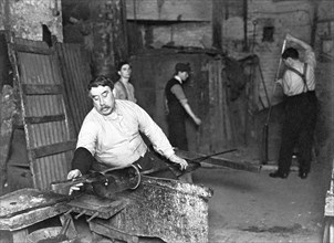 Worker at Whitefriars Glassworks, City of London, (early 20th century?). Artist: Unknown