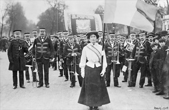 Daisy Dugdale leading the procession to welcome Emmeline and Christabel Pankhurst, London, 1908. Artist: Unknown