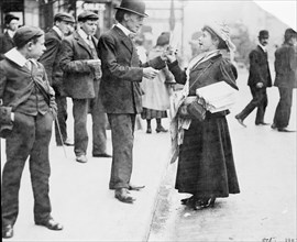 Mary Phillips selling Votes for Women in London, October 1907. Artist: Unknown