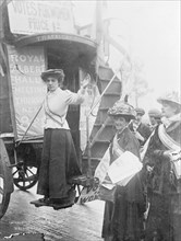 Barbara Ayrton on the bottom stair of the Votes for Women bus, October 1909. Artist: Unknown