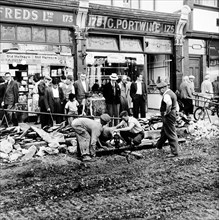Road repairs in Portobello Road, London, c1956. Artist: Henry Grant