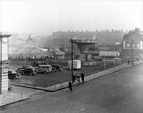 Aldgate Funfair, London, 1950s. Artist: Henry Grant