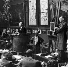 Auction at Sotheby's, London, 1961. Artist: Henry Grant