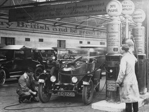 Morris Cowley Bullnose in a garage, 1925. Artist: Unknown