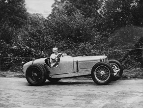 Kay Petre driving a Riley, Autumn Hill Climb, Shelsley Walsh, Worcestershire, 1935. Artist: Unknown