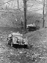 Peter Collins taking part in a hill climb, March 1949. Artist: Unknown