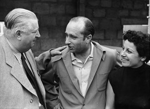 Alfred Neubauer with Juan Manuel Fangio and his wife, c1954-c1955. Artist: Unknown