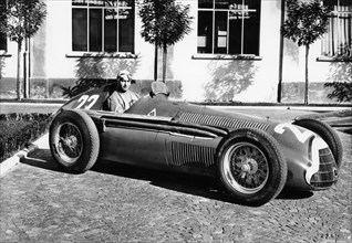 Fangio in Alfa Romeo, prior to the San Remo Grand Prix, Italy, 1950. Artist: Unknown