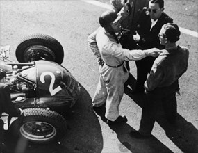Giuseppe Farina and Alfa Romeo 159, French Grand Prix, Rheims, 1951. Artist: Unknown
