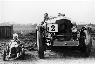 Frank Clement and Woolf Barnato in a Bentley Speed 6, Brooklands, Surrey, 1930. Artist: Unknown
