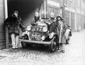 J Walters, JA Driskell, R Silva and ID Stuthers with a Ford V8, (1932?). Artist: Unknown