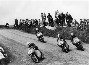 Action from the Lightweight TT race, Isle of Man, 1958. Artist: Unknown
