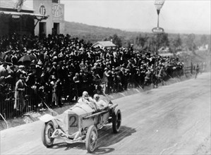 Christian Lautenschlager passing the tribunes, in the Targa Florio race, Sicily, 1922. Artist: Unknown