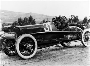 Wild driving an Itala 51, in the Targa Florio race, Sicily, 1922. Artist: Unknown