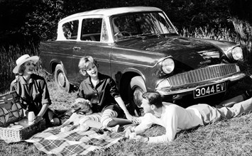People picnicking with their 1960 Ford Anglia Deluxe, (1960?). Artist: Unknown