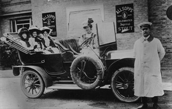 A group of ladies in a car, with their uniformed chauffeur, 1910. Artist: Unknown