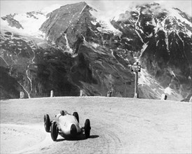 Hermann Muller in an Auto Union, German Mountain Grand Prix, Grossglockner, Austria, 1939. Artist: Unknown