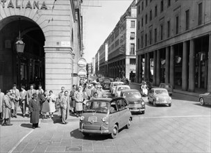 Fiat 600 Multipla leading a procession of Fiats, Italy, (late 1950s?). Artist: Unknown