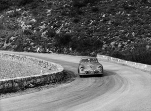Porsche 356 taking a corner in the Monte Carlo Rally, 1954. Artist: Unknown