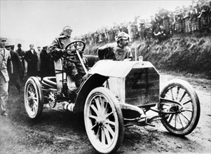 Camille Jenatzy in his 60 hp Mercedes, winner of the Gordon Bennett Race, Athy, Ireland, 1903. Artist: Unknown