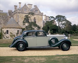 A 1938 Rolls-Royce Phantom III. Artist: Unknown