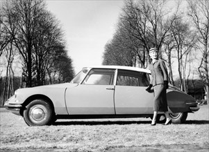 Model with a 1957 Citroën ID 19, c1957. Artist: Unknown