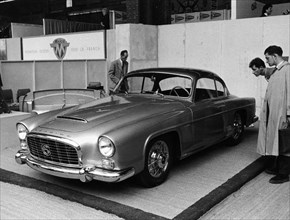 A 1956 Grégoire 2.1 litre coupé on a stand at a show, (c1956?). Artist: Unknown