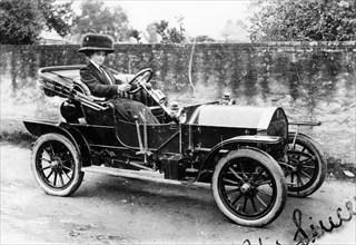 A woman at the wheel of an 8hp Humber, 1909. Artist: Unknown