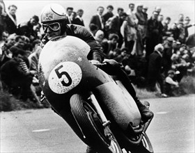 Mike Hailwood, on an MV Agusta, winner of the Isle of Man Senior TT, 1964. Artist: Unknown
