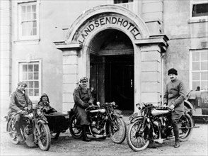 Motorcyclists with Mk1 Brough Superiors outside the Land's End Hotel, Cornwall, 1921. Artist: Unknown