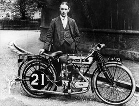 Billy Jones with an AJS motorbike, 1914. Artist: Unknown