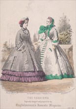 Two women model the latest fashions, 1861. Artist: Anon