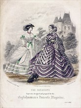 Two women wearing the latest fashions in an outdoor setting, 1860. Artist: Anon