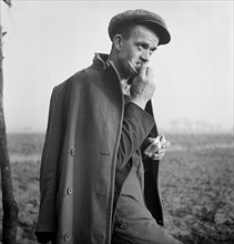 A farm worker eating his lunch, Lincolnshire, c1946-c1959