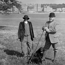 Man in breeches with a dog and a mannequin, Holkham Hall, Norfolk, 1978-1981