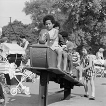 Children on a rocking horse, Clissold Park, Stoke Newington, London, 1962-1964