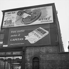 Advertising hoardings, Fortnam Road, Holloway, London, 1960-1965