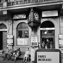 Passengers waiting outside the ticket office, Charing Cross Station, London, 1970