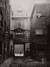 View of the gateway to the Oxford Arms Inn, Warwick Lane, City of London, 1875.